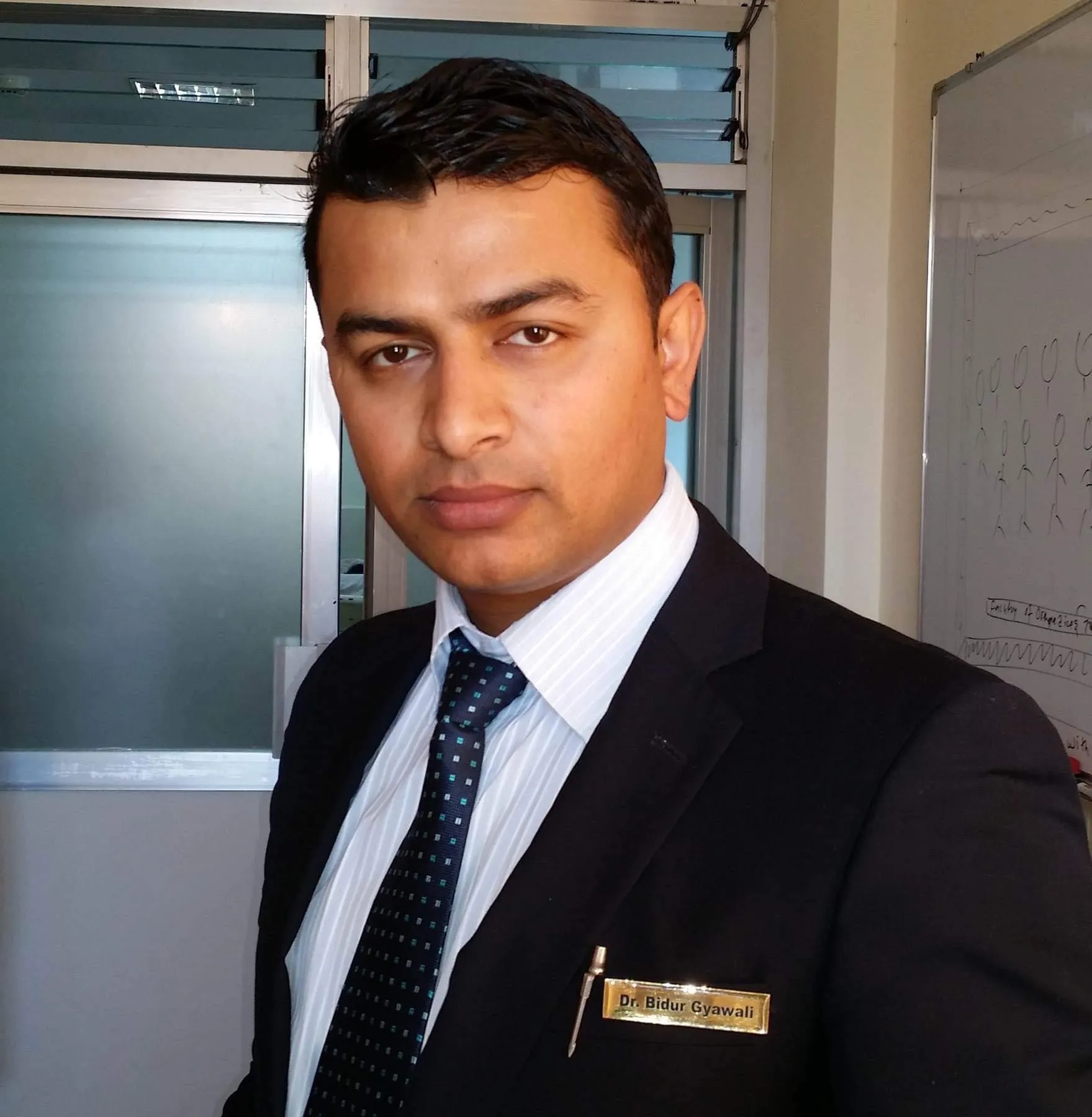 Dr. Bidur Gyawali